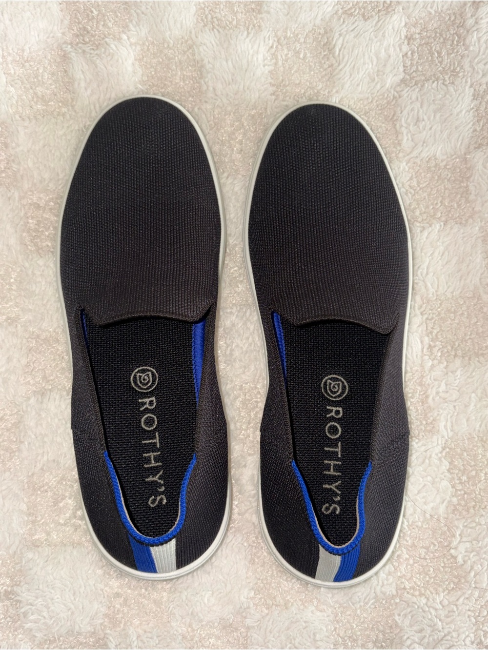 Rothy’s The Original Slip On Sneaker in Black
Size 9